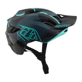 Casco Bicicleta Troy Lee Designs Flowline SE Badge Carbon / Real Teal